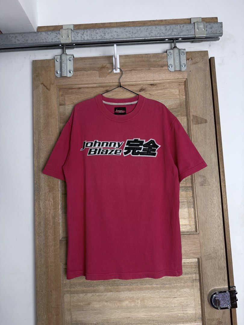 Johnny Blaze T-shirt (Category: Tshirts & Polo Shirts ) located in San Pablo. Submitted by zzz.archvs (Listing ID 1424546717, Image 1). Description: - Johnny Blaze T-shirt - Crew neck - Short sleeves - Bold brand logo on the front - Solid pink color - Comfortable fit - Stylish design.