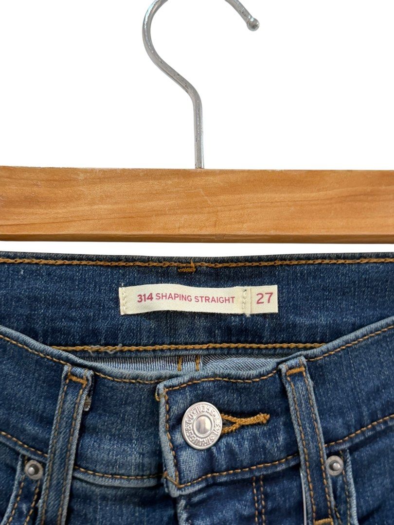 Levi's 314 Shaping Straight Jeans - Size 27 (Category: Jeans) located in Bacolod City. Submitted by BellaCo (Listing ID 1424546553, Image 2). Description: - Levi's 314 Shaping Straight Jeans - Size: 27 - Color: Classic Blue Wash - Style: Straight Leg - Features: Button closure, five-pocket design - Condition: Unworn, with original tags attached.