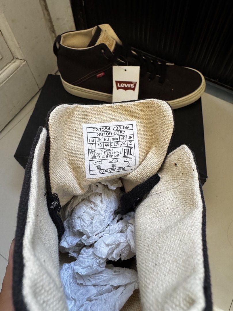 Levi's Sherwood High Sneakers (Category: Sneakers) located in Taguig. Submitted by declutterme12 (Listing ID 1424533944, Image 3). Description: - Levi's Sherwood High sneakers - Color: Black - Style: High-top - Upper: Canvas - Sole: Rubber (Brown) - Size: US 11 / EUR 44 - Includes original box and tags - Interior: Beige - Made in China.
