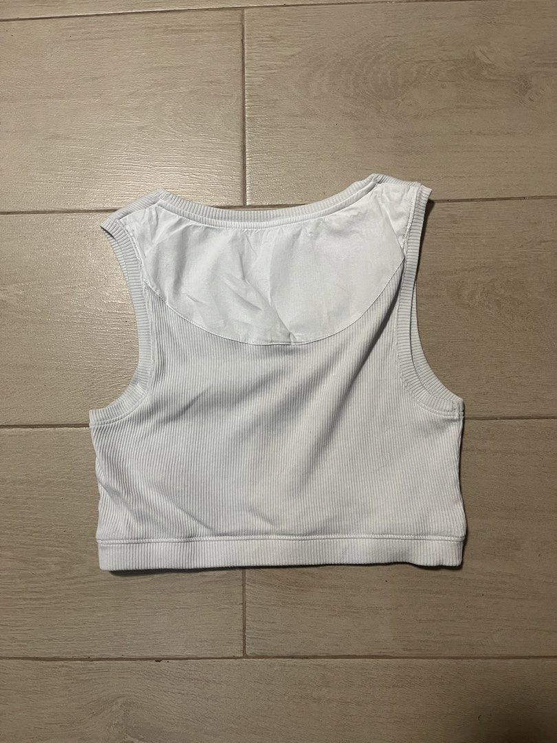 Loewe Ribbed Crop Tank Top (Category: Sleeveless) located in Makati City. Submitted by sixelaa (Listing ID 1424640748, Image 2). Description: - Loewe white ribbed crop tank top - Features embroidered Loewe logo - with back panel - Sleeveless design - Round neckline - Perfect for casual wear - authentic Size M on tag, but fits small and under.
