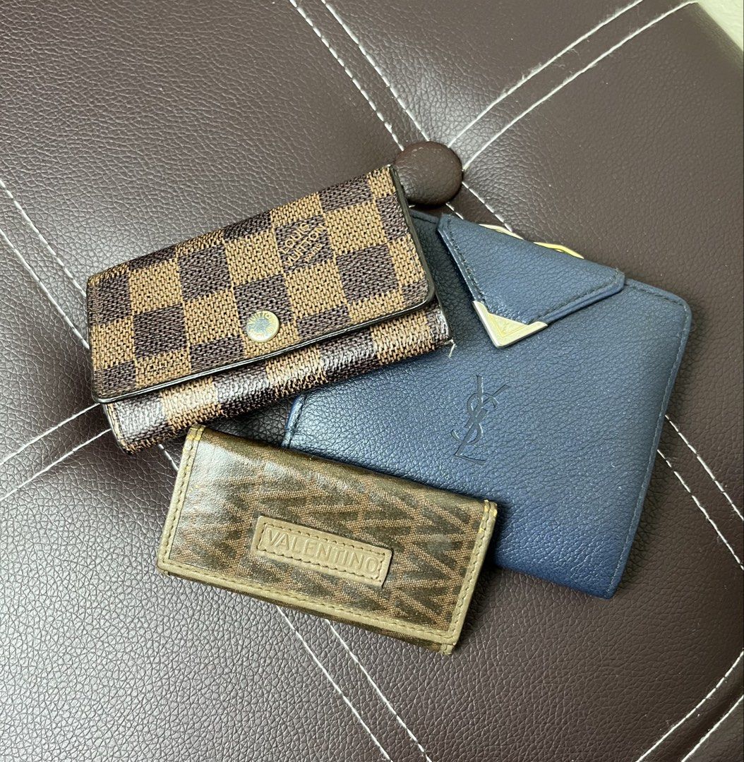 Louis Vuitton, YSL & Valentino Wallets & Key Holder Aspack (Category: Luxury Bags & Wallets) located in Cabanatuan. Submitted by cabsygoods (Listing ID 1424559694, Image 1). Description: Louis Vuitton, YSL & Valentino Wallets & Key Holder Aspack Very good condition Issue normal sign of usage Still presentable Dm to purchase! 📩.