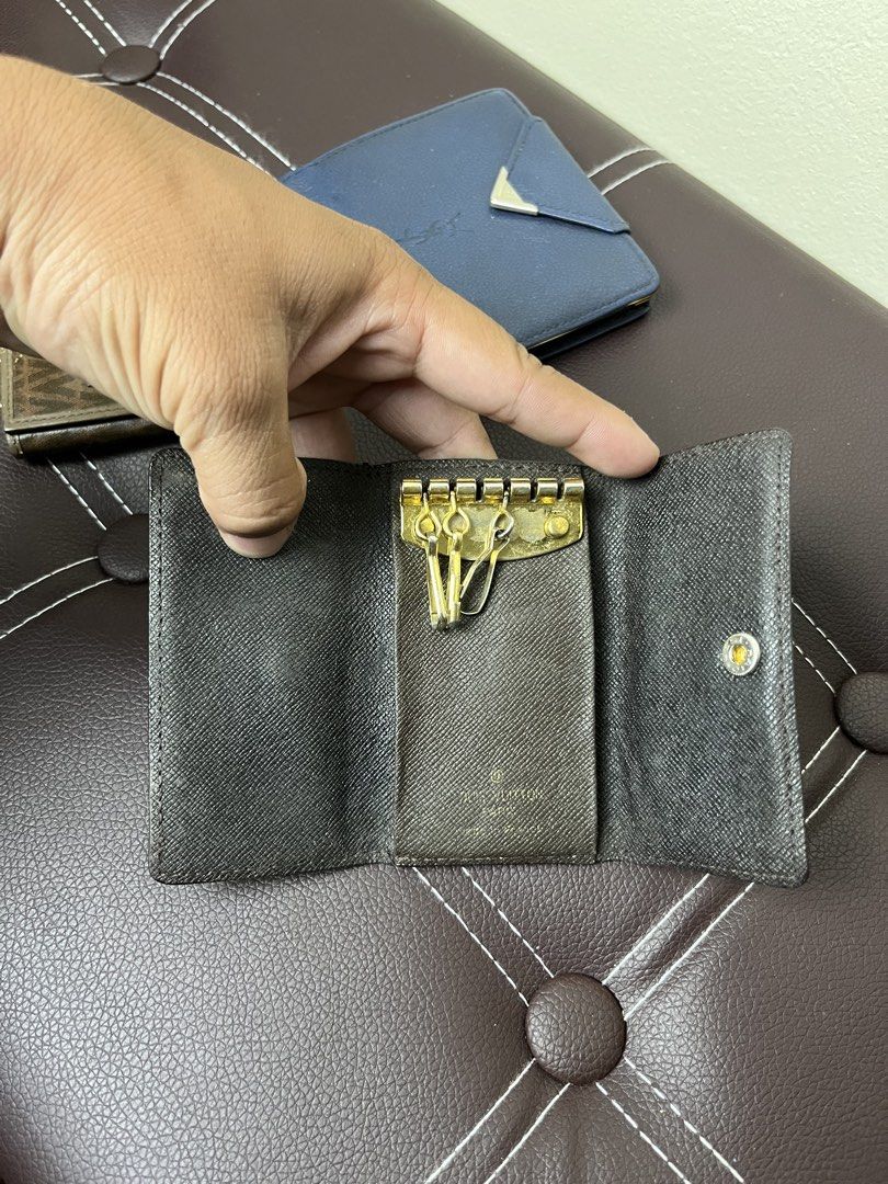 Louis Vuitton, YSL & Valentino Wallets & Key Holder Aspack (Category: Luxury Bags & Wallets) located in Cabanatuan. Submitted by cabsygoods (Listing ID 1424559694, Image 3). Description: Louis Vuitton, YSL & Valentino Wallets & Key Holder Aspack Very good condition Issue normal sign of usage Still presentable Dm to purchase! 📩.