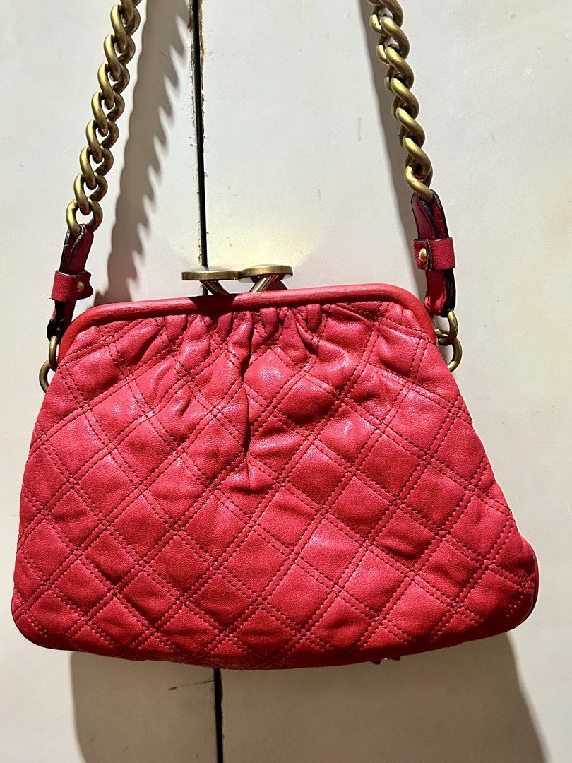 Marc Jacobs STAM bag ♥️♥️♥️ (Category: Luxury Bags & Wallets) located in Quezon City. Submitted by asiaco (Listing ID 1424609457, Image 2). Description: Pretty in RED ♥️ Authentic Marc Jacobs stam bag. Features a chain strap, kiss-lock closure, and gold-toned hardware. Includes a front zippered pocket and interior pocket. Comes with original tags. Minimal flaws, clean interior 👍🏻✔️.