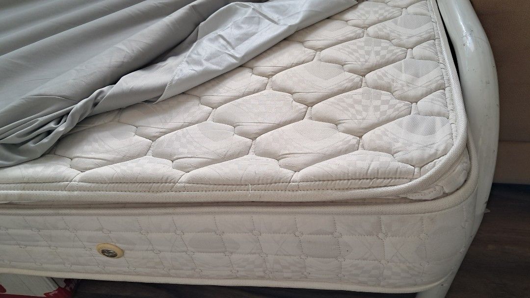 Metal Bed frame with Mattress size Double (Category: Bed Frames & Mattresses) located in Santa Rosa. Submitted by majanice (Listing ID 1424588699, Image 2). Description: - Double bed frame - White, curved design - spring mattress included - Ready for immediate use PICK UP LOCATION : silang cavite condition: steel frame can be disassembled spring mattress firm no issue no damage note pillows not included.