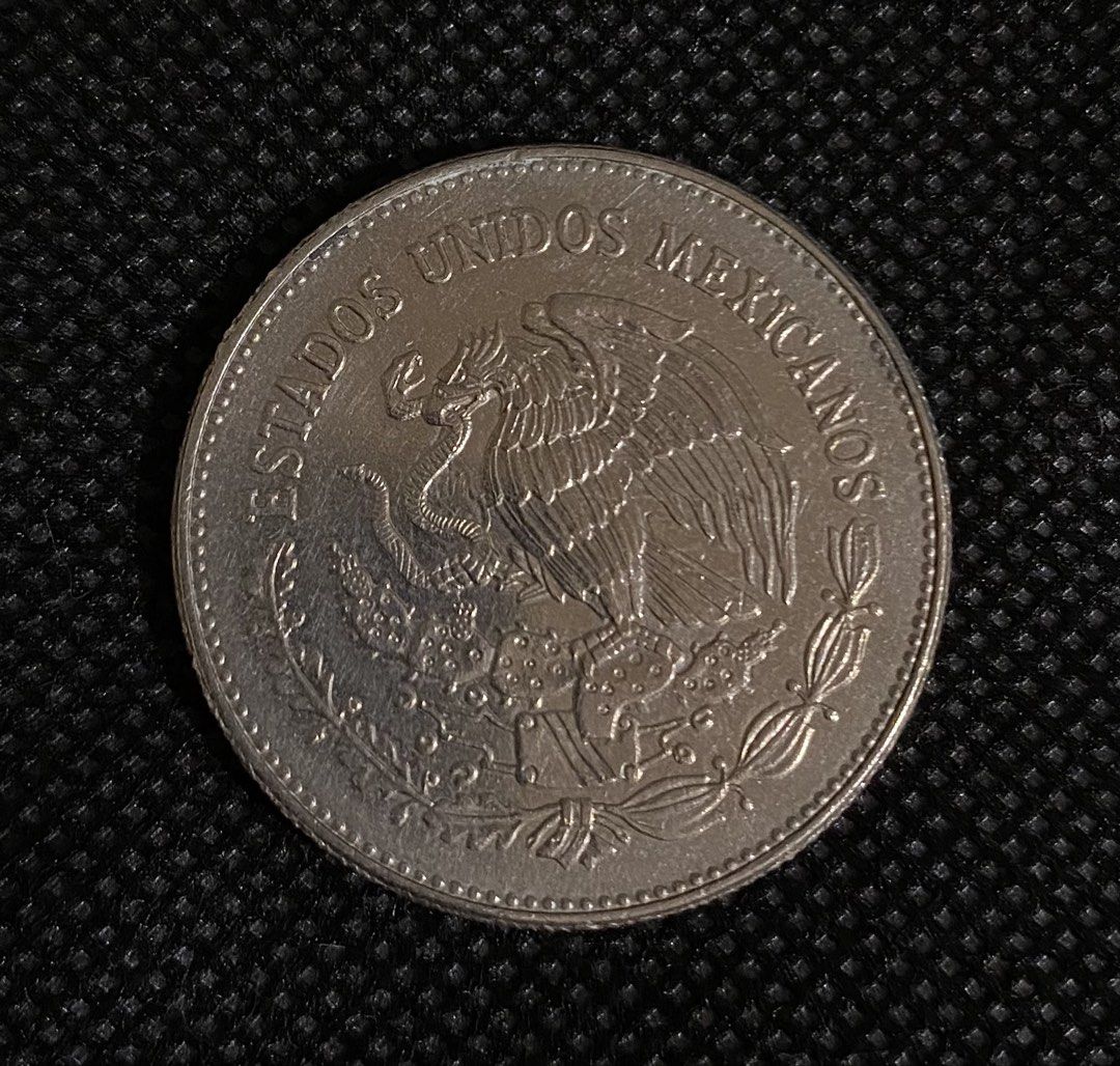 Mexican 50 Pesos Coin 1983 (Category: Currency) located in Las Pinas. Submitted by coins_of_the_world (Listing ID 1424562035, Image 2). Description: Commemorative 50 Pesos Mexican coin depicting the Aztec moon goddess Coyolxauhqui, minted between 1982 and 1984. Included PHP10 in the third photo for size comparison..