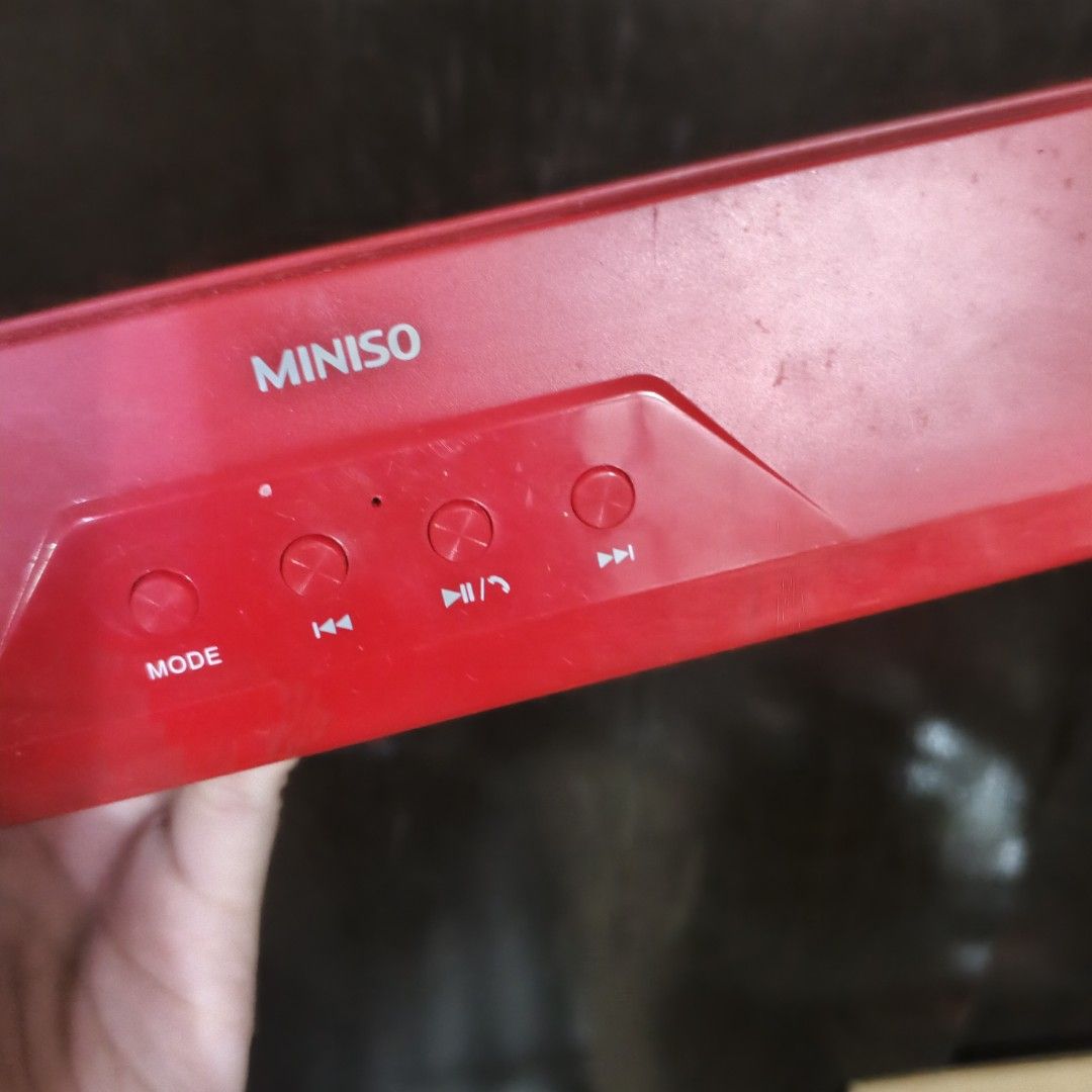 Miniso Double-Horn Stereo Wireless Speaker (Category: Soundbars, Speakers & Amplifiers) located in Santa Rosa. Submitted by elle7777 (Listing ID 1424678878, Image 2). Description: Miniso wireless speaker features a double-horn stereo design. It has a red body with black speaker mesh. The speaker has several control buttons, including mode, play/pause, and skip. It includes USB, micro USB, and aux ports. The model number is DS-1338. Input is 5V 1A