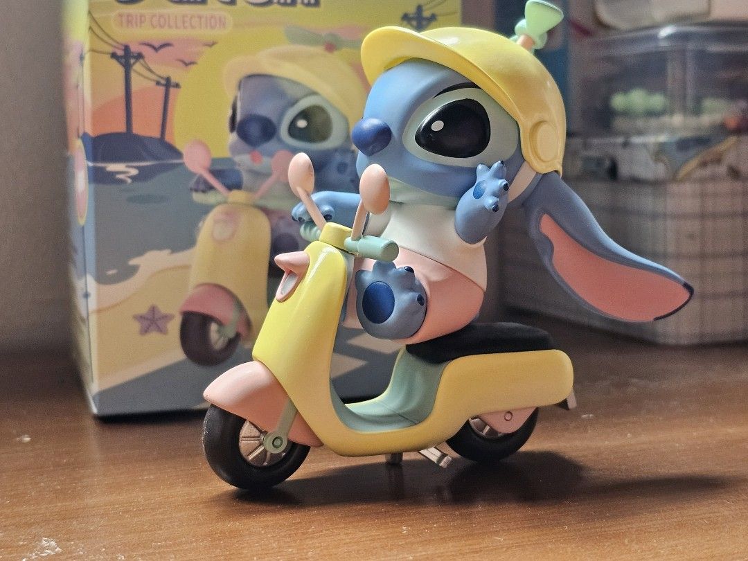 Miniso Stitch Trip Collection Blind Box Figurine (Category: Designer & Blind Box Toys) located in Quezon City. Submitted by findsbydavie (Listing ID 1424604626, Image 2). Description: - - Comes with box - Good as new - Motorcycle and Stitch stands on its own - Motorcycle steering can be turned - Wheels work - Hat spinny thing spins RFS: decluttering Non-negotiable price.