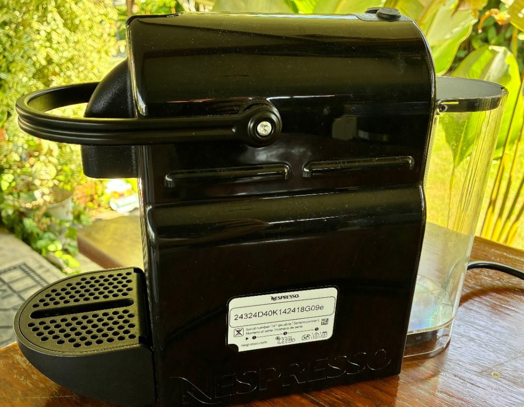 Nespresso Coffee Machine (Category: Coffee Machines & Makers) located in Caloocan City. Submitted by noblehorse-95f4 (Listing ID 1424578053, Image 2). Description: Black Nespresso coffee machine. Very lightly used for only a few months. Well maintained. RFS: stopped drinking coffee No box, round plug..