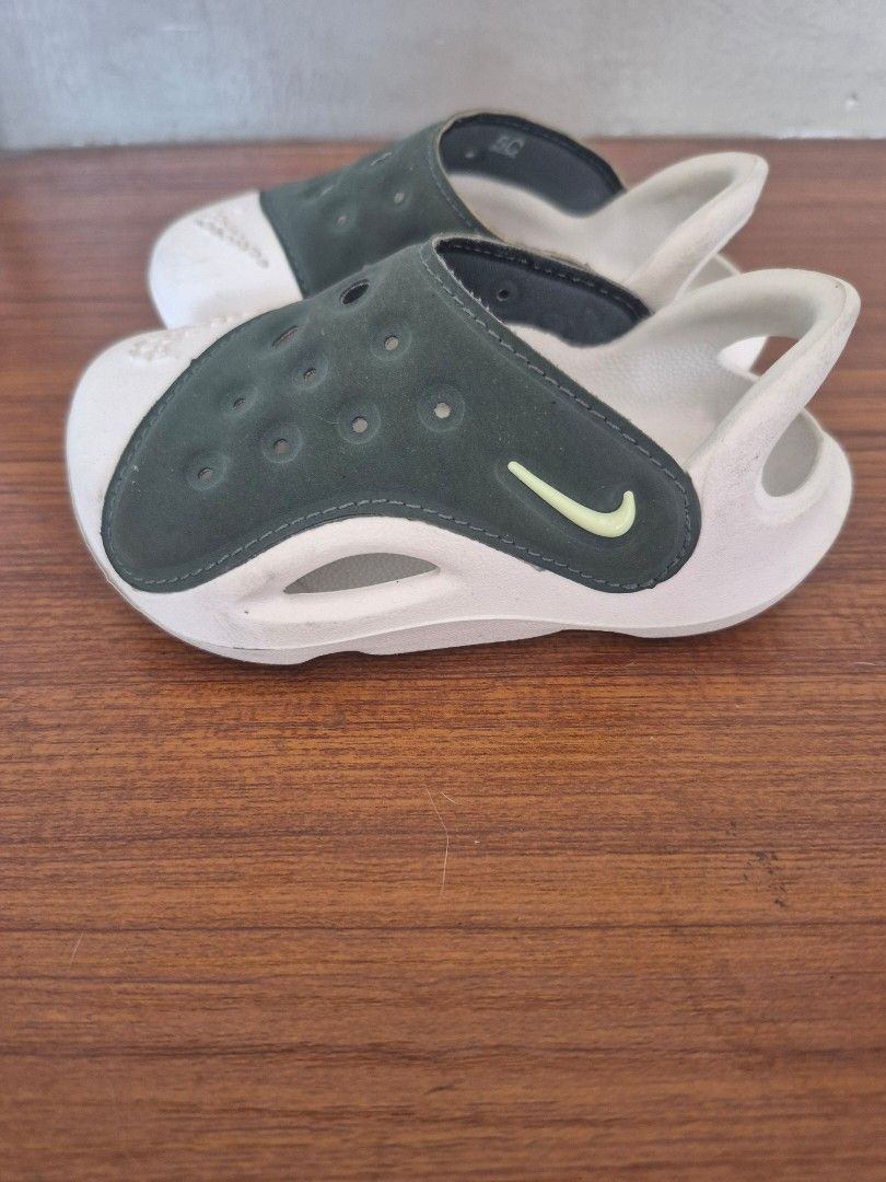 Nike Aqua Swoosh Sandals 5C (Category: Flats & Sandals) located in Quezon City. Submitted by nfr03 (Listing ID 1424541269, Image 3). Description: Size 5c. still in good condition, just needs cleaning rfs: outgrown.