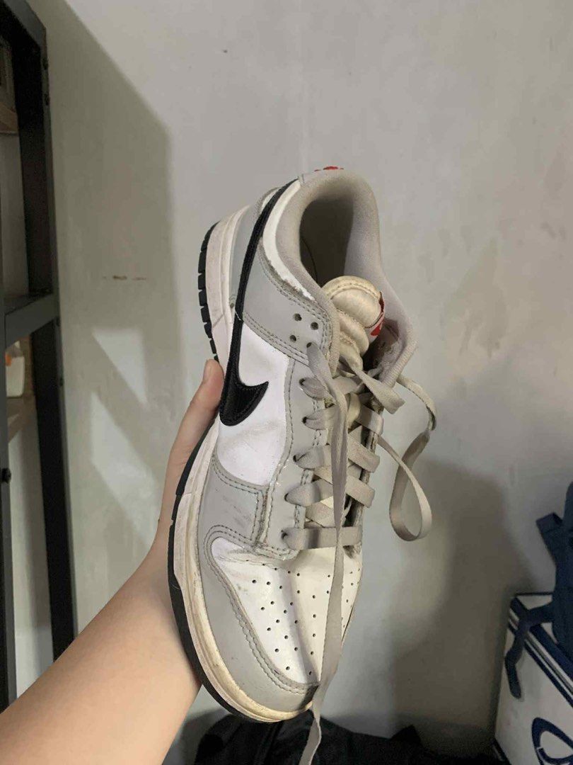 NIKE DUNK LOW LIGHT IRON (Category: Sneakers) located in Quezon City. Submitted by nikishanicolas (Listing ID 1424575677, Image 3). Description: - FOR SALE Nike Dunk Low Light Iron Ore – Women’s Size: 8 Colorway: Grey, white, and black Condition: USED, just NEEDS A DEEP CLEAN 👍 * Stylish & versatile design * Crease (easy fix) * Faded insole logo – not visible when worn CAN BE USED BY MEN Reason for Selling: Not using it anymore .