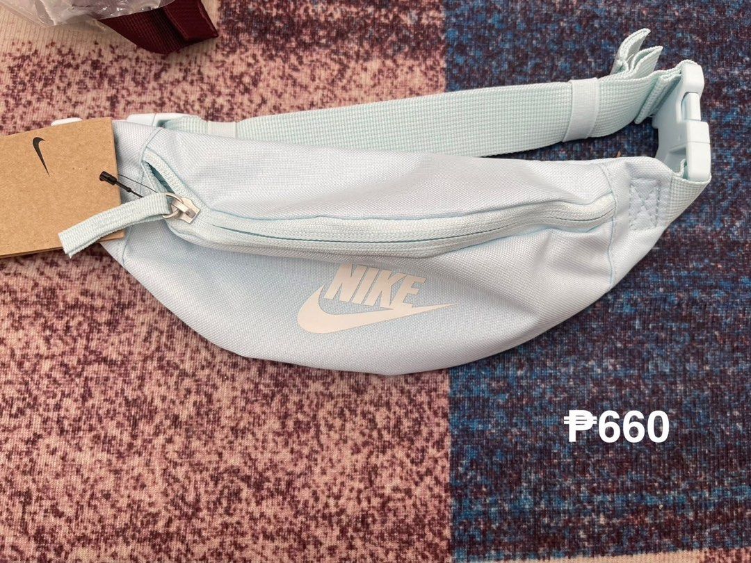 Nike small belt bag (Category: Belt bags, Clutches and Pouches) located in Las Pinas. Submitted by UNQUARANTINED (Listing ID 1424578908, Image 1). Description: - Nike small belt bag - Light blue color - Ideal for everyday use - Please refer to the second image for payment and shipping details..