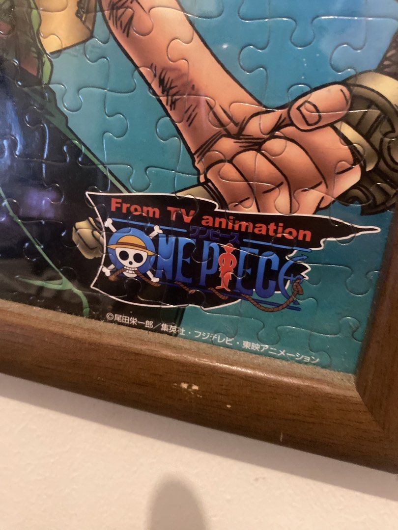 One Piece Zoro Puzzle FRAME (Category: Art & Prints) located in Manila. Submitted by ejothegod (Listing ID 1424605837, Image 2). Description: For sale 1k only rush - Framed One Piece puzzle featuring Zoro. - From the TV animation series. - Wooden frame included. - Depicts Zoro in action poses. - Complete puzzle..
