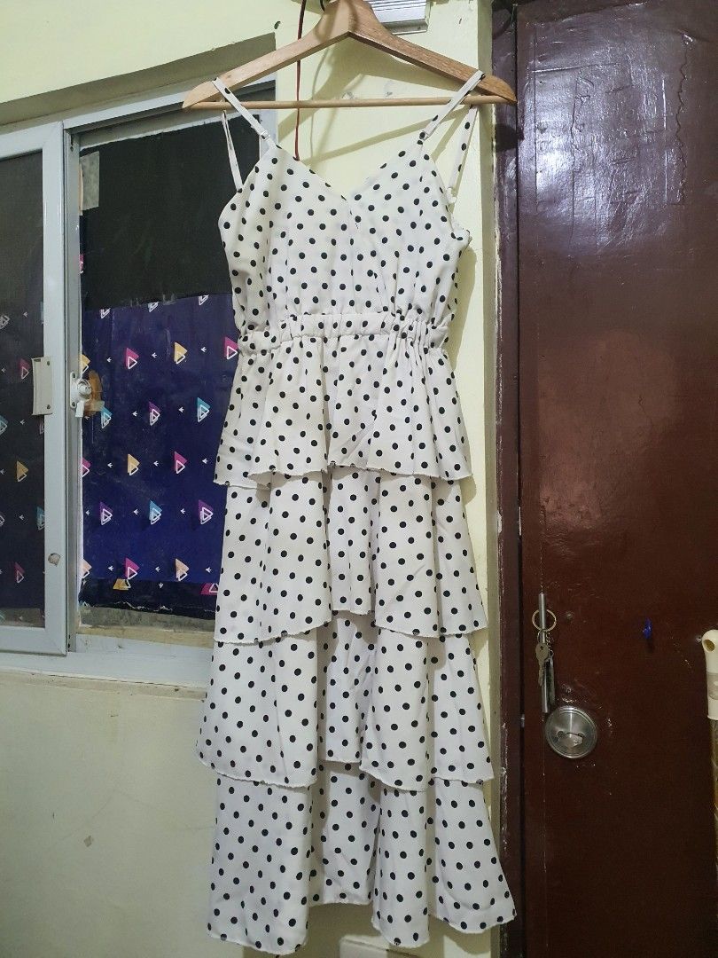 Polka Dot Tiered Cake Layered Dress (Adjustable Strap) (Category: Dresses) located in Balanga. Submitted by ms.parkfilter (Listing ID 1424382077, Image 3). Description: Polka Dot Tiered Cake Layered Dress (Adjustable Strap) - Size SMALL-MEDIUM (garterized waistband) - Tiered design - Spaghetti straps (adjustable) - Fitted waist - V-neckline - Midi length - Lightweight fabric.