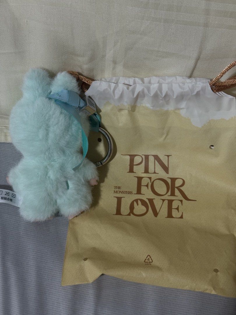POP MART The Monsters Pin For Love (Category: Designer & Blind Box Toys) located in Valenzuela. Submitted by danabananani (Listing ID 1424627471, Image 2). Description: - POP MART The Monsters Pin For Love plush toy - Cute monster design - Mint green, fluffy exterior - Comes with original drawstring bag and tag - Perfect for collectors or gifts - RFS: Not prio color/letter.