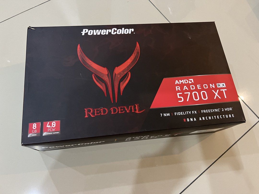 PowerColor Red Devil AMD Radeon RX 5700 XT 8GB (Category: Computer Parts) located in Petaling Jaya. Submitted by artful.loft (Listing ID 1424671296, Image 1). Description: - PowerColor Red Devil RX 5700 XT with 8GB memory - 7nm technology for efficient performance - Features Fidelity FX and FreeSync 2 HDR - RDNA architecture - Enhanced cooling with dual BIOS, backplate, and three fans - Distinctive Red Devil design - Comes with the original box.