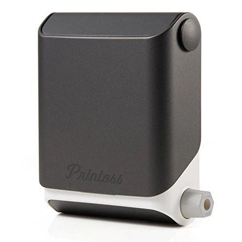Printoss Smartphone Analog Instax Mini Printer (White) (Category: Printers, Scanners & Copiers) located in Makati City. Submitted by cleanslate.zip (Listing ID 1424525987, Image 2). Description: - Sleek dark grey and white design - Easy to use - Prints photos directly from your smartphone - Features a side button and photo output slot.