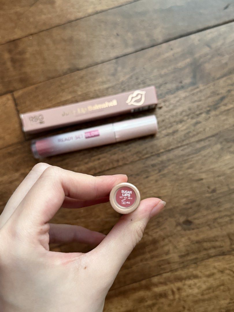 READY SET GLOW RSG COSMETICS Bundle (Category: Makeup) located in Makati City. Submitted by colettecollective (Listing ID 1424585610, Image 3). Description: BUNDLE INCLUDES: 1. Badass Face & Body Mist 2. Badass Lip Stain - Sugar Lips 3. Juicy Lip Balmshell - Cotton Kisses 4. Ooh La La - Pink Tea Souffle *All brand new*.