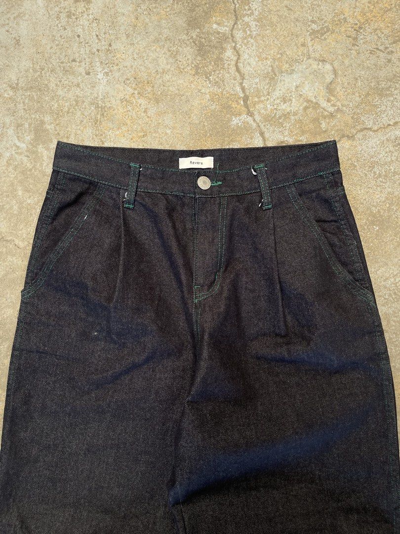 Revere Dark Wash Jeans (Category: Jeans) located in Bulacan. Submitted by archivesgallery_ (Listing ID 1424601278, Image 3). Description: -Raw Denim Pleated jeans -Measurements Waist: 31 Rise: 12.5 Length: 40.5 Leghole: 8.5 Thigh: 11.5 - Green stitching details - Button closure - Pleats at the front - Two front and two back pockets - Straight leg fit.