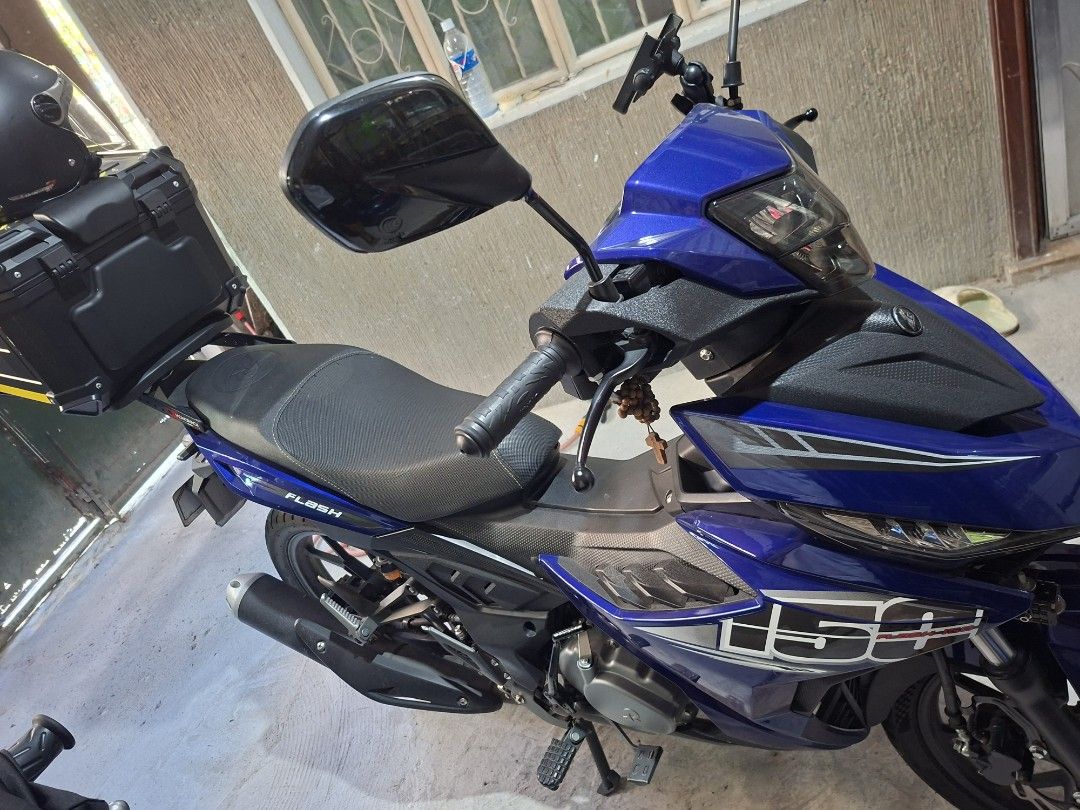 Rusi Flash 150 Motorcycle (Category: Motorbikes for Sale) located in Manila. Submitted by d_of_olx (Listing ID 1424530816, Image 3). Description: Rusi flash 150 2024 model (acquired fr casa nov 2024) Registered until sept 2027 1st owned 2 original keys 3400 kms only Carb type Manual, booklet, tools included New tires mas makapit/malapad (Maximus) Nice and bright MDL E sama ko na my brand new top box Alaga, seldom use No issue almost brand new Mak