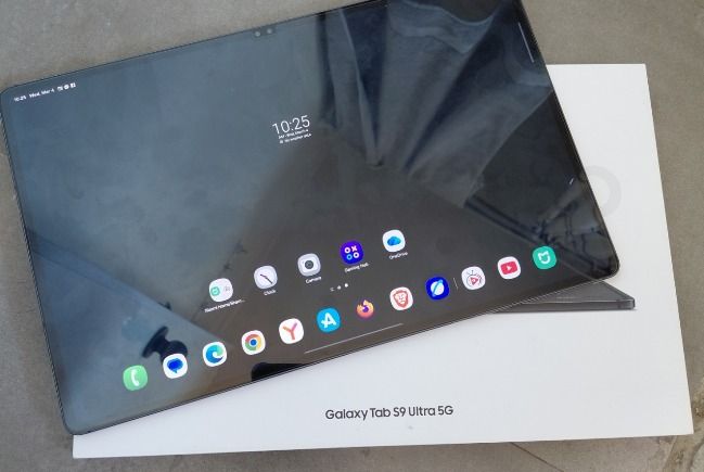Samsung Galaxy Tab S9 Ultra 5G (Category: Android) located in Mandaluyong City. Submitted by mikosales (Listing ID 1424571536, Image 2). Description: - Samsung Galaxy Tab S9 Ultra 5G - Color: Gray 256gb space gray - Includes original box - Pristine condition - SnapDragon processor - 5g sim/esim open line any network - Super smooth no issues ggamitin nalang - Features time display and app icons on screen - Rear camera setup and Samsung logo presen