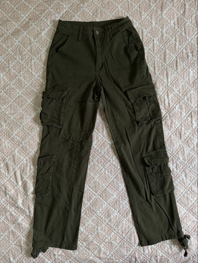 SHEIN Felix Cargo Pants (Category: Other Bottoms) located in Manila. Submitted by andreaaarut2 (Listing ID 1424570562, Image 1). Description: - Ivy Felix Bought in SHEIN - Olive Green - Cargo Pants - Features: Multiple pockets, zipper and button closure, ankle tie details - Details: Brand tag visible - Perfect for casual wear RFS: doesn’t fit me anymore 🩶🙏🏼.