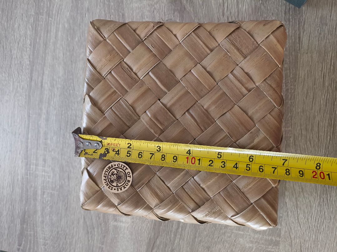 Small Banig Woven Storage Box (Tampipi) (Category: Storage Boxes & Baskets) located in Mandaluyong City. Submitted by delubyoboi (Listing ID 1424702478, Image 3). Description: - May City of Roxas na pin but surely removable - Light brown color - Banig - Small size Issue: NONE RFS: Decluttering.