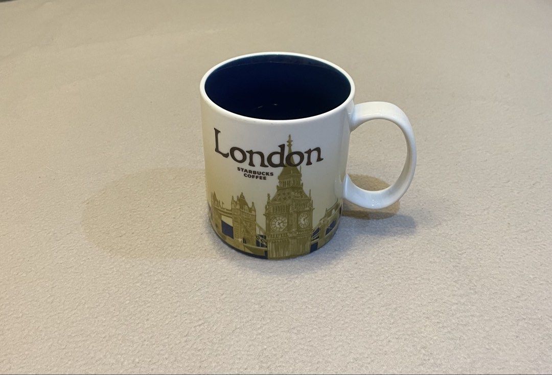 Starbucks London Mug (Category: Coffee & Tea Tableware) located in Paranaque City. Submitted by bermudezish (Listing ID 1424636298, Image 1). Description: - Starbucks London mug - Features the London skyline - White exterior - Dark blue interior - Includes the Starbucks logo - Has a handle for easy gripping Hi! 🤍 Decluttering some unused and used once or twice stuff. ☺️ mop: gcash, gotyme, bpi delivery: lalamove, grab 📍Better Living Subd., Para