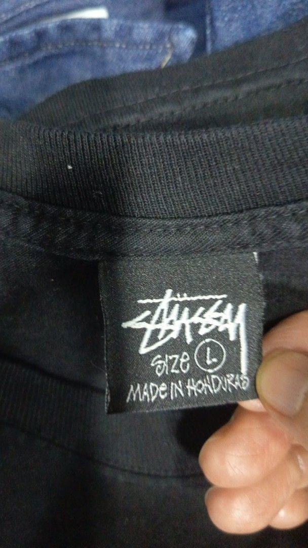 Stussy Black Graphic Tee - Size L (Category: Tshirts & Polo Shirts ) located in Cagayan de Oro. Submitted by chloedime (Listing ID 1424572941, Image 3). Description: - Stussy t-shirt - Size: Large - Front: White logo - Back: Graphic with Stussy Inc. address and phone design - Material: 100% Cotton - Made in Honduras.