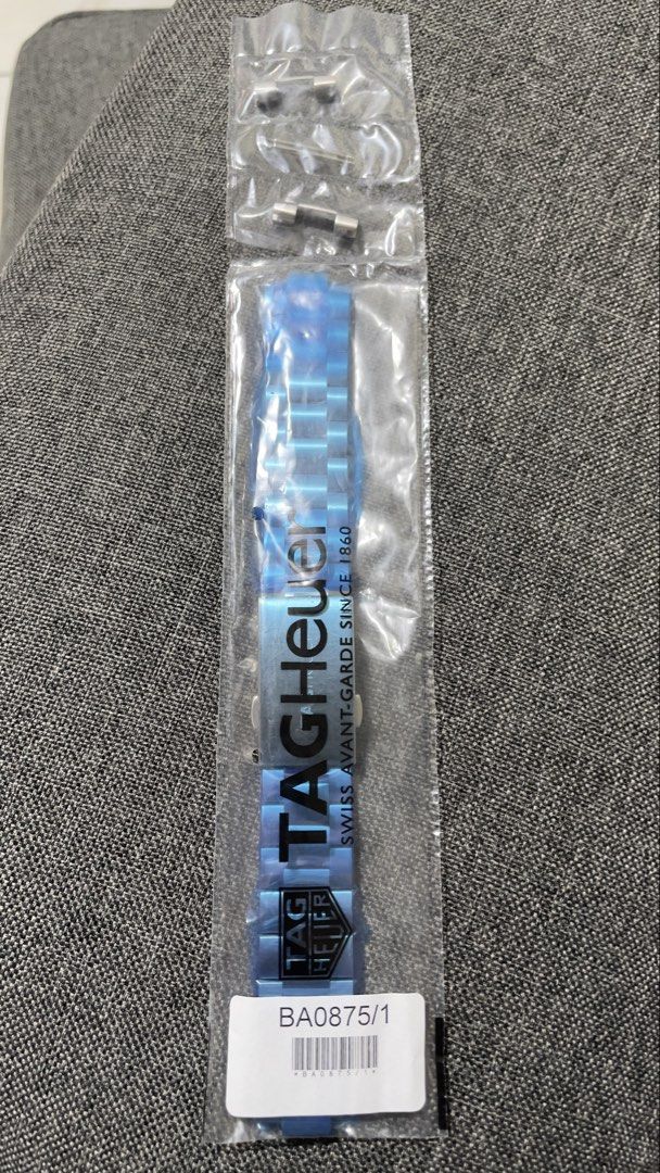 Tag Heuer BA0875 Watch Strap Authentic (Category: Luxury Watches) located in Imus. Submitted by WellWatchesss (Listing ID 1424591345, Image 1). Description: - Authentic Tag Heuer watch strap (model BA0875/1) - Elegant blue color - Comes with original packaging - Includes installation pins - Features Tag Heuer logo and "Swiss Avant-Garde Since 1860" text - Durable stainless steel clasp FOR 41mm F1 models.