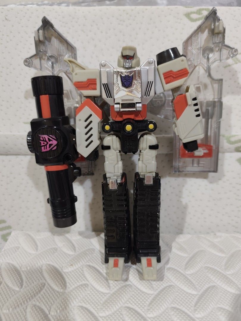 Takara Tomy Transformers Henkei D-01 Megatron (Category: Action & Battle Toys) located in Baguio. Submitted by cjshunts (Listing ID 1424636205, Image 1). Description: Takara Tomy Transformers Henkei D-01 Megatron - Transforms into a gun some parts yellowing See pictures for details Location Baguio City Payment before drop/ship shipping fee at buyer's expense.