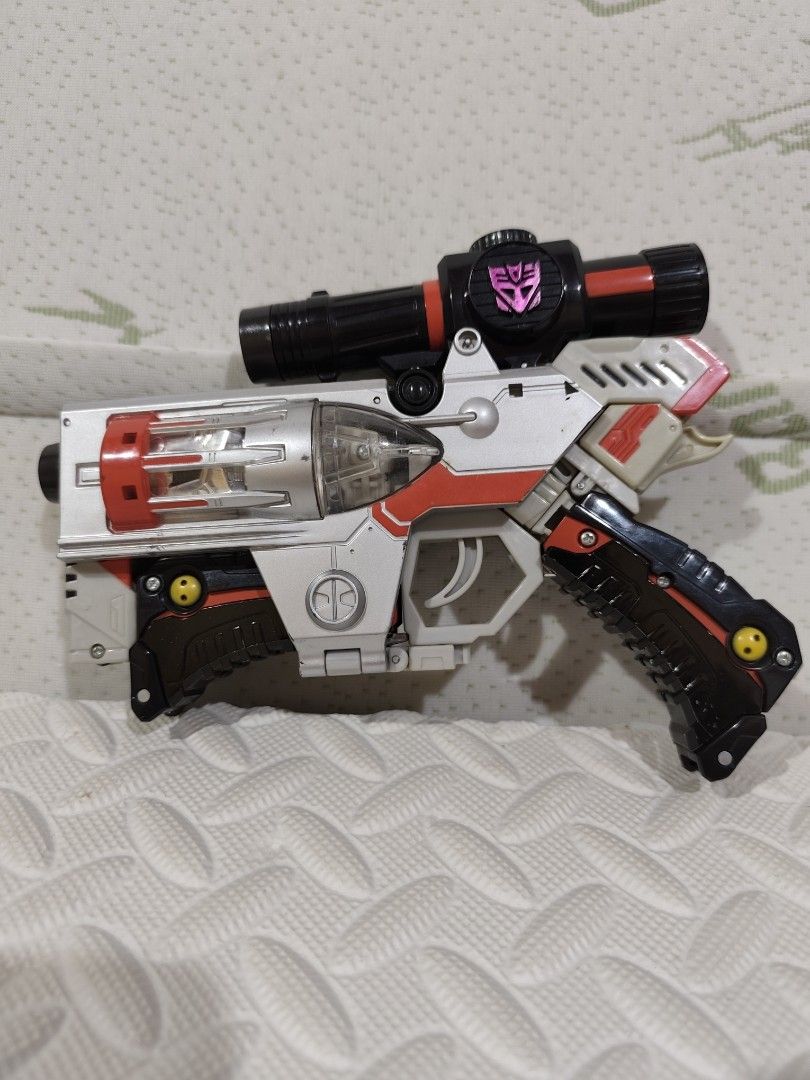 Takara Tomy Transformers Henkei D-01 Megatron (Category: Action & Battle Toys) located in Baguio. Submitted by cjshunts (Listing ID 1424636205, Image 2). Description: Takara Tomy Transformers Henkei D-01 Megatron - Transforms into a gun some parts yellowing See pictures for details Location Baguio City Payment before drop/ship shipping fee at buyer's expense.