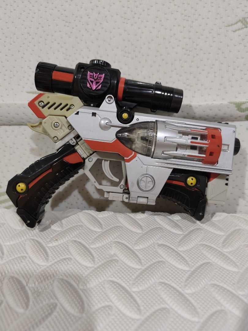 Takara Tomy Transformers Henkei D-01 Megatron (Category: Action & Battle Toys) located in Baguio. Submitted by cjshunts (Listing ID 1424636205, Image 3). Description: Takara Tomy Transformers Henkei D-01 Megatron - Transforms into a gun some parts yellowing See pictures for details Location Baguio City Payment before drop/ship shipping fee at buyer's expense.
