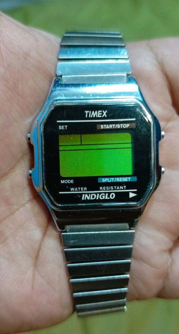 Timex Digital Watch (Category: Men's Watches) located in Manila. Submitted by welbern (Listing ID 1424556341, Image 1). Description: Vintage Timex digital watch with Indiglo feature. Features a stainless steel back and water resistance up to 30M. The watch has a digital display with mode, set, start/stop, and split/reset functions. The watch band is made of stainless steel. The watch is a classic design..