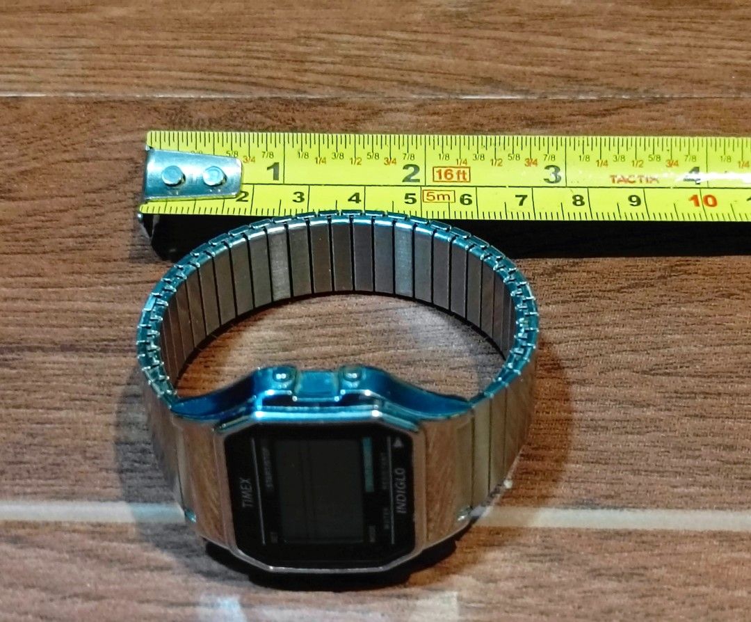 Timex Digital Watch (Category: Men's Watches) located in Manila. Submitted by welbern (Listing ID 1424556341, Image 3). Description: Vintage Timex digital watch with Indiglo feature. Features a stainless steel back and water resistance up to 30M. The watch has a digital display with mode, set, start/stop, and split/reset functions. The watch band is made of stainless steel. The watch is a classic design..