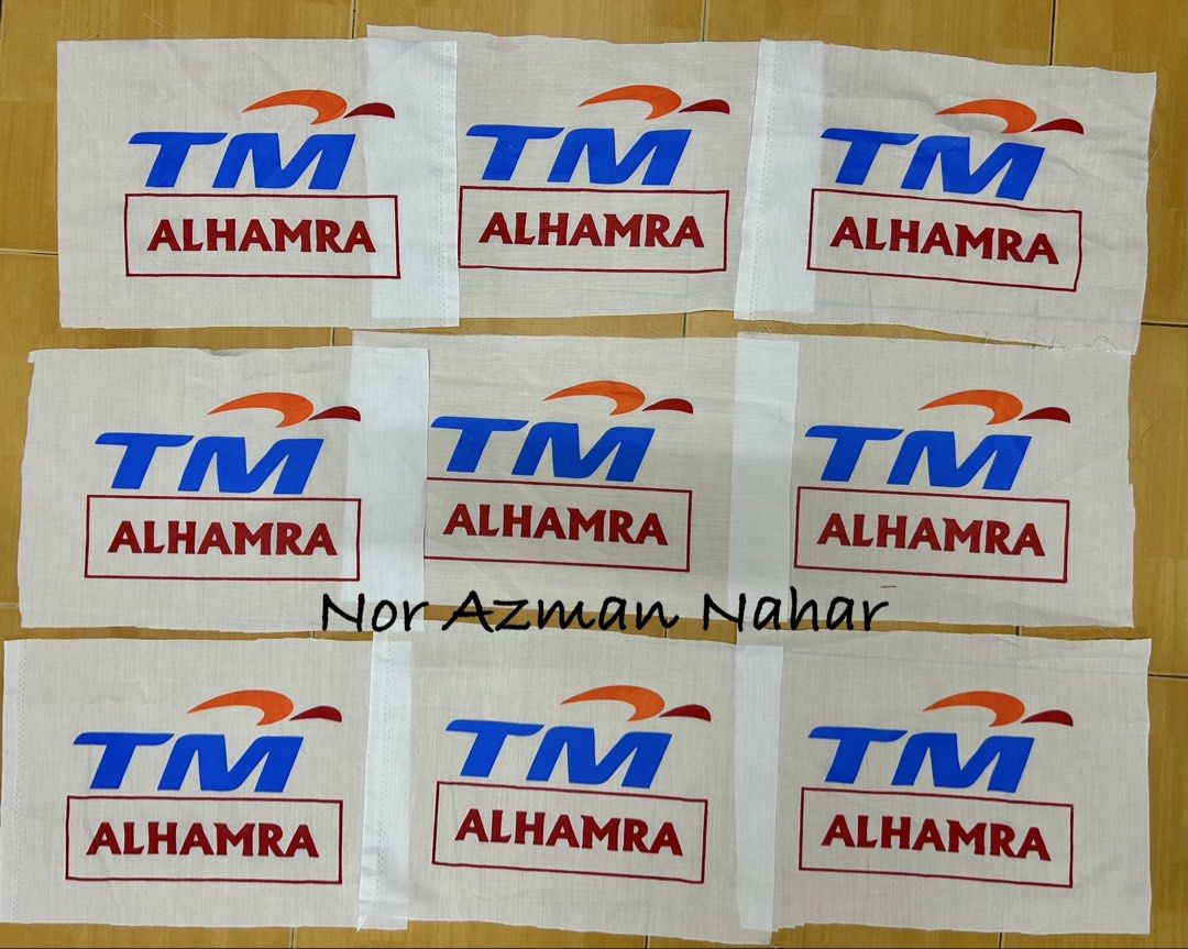 TM Alhamra Flags Patch (Category: Activewear) located in Shah Alam. Submitted by naz_mann (Listing ID 1424633678, Image 1). Description: - TM Alhamra flags available - Features the TM logo - Includes the word "ALHAMRA" in a box - Flags are white with blue, orange, and maroon details - Multiple flags available.