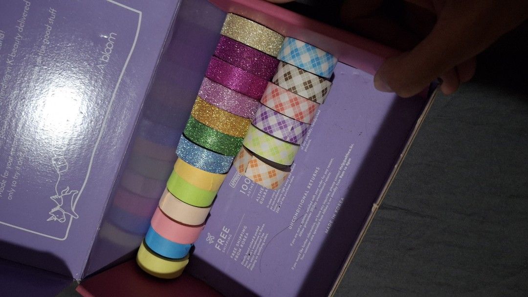 Washi Tape Set - Assorted Colors (Category: Craft Supplies & Tools) located in Las Pinas. Submitted by mgr29 (Listing ID 1424647577, Image 1). Description: - Variety of colorful washi tapes - Includes glitter and patterned designs - Ideal for crafts and scrapbooking - Adds a decorative touch to projects - Neatly organized in a box.