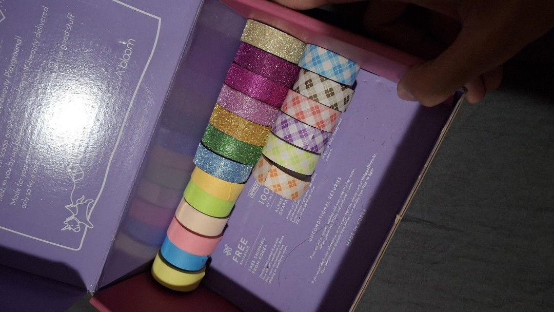 Washi Tape Set - Assorted Colors (Category: Craft Supplies & Tools) located in Las Pinas. Submitted by mgr29 (Listing ID 1424647577, Image 2). Description: - Variety of colorful washi tapes - Includes glitter and patterned designs - Ideal for crafts and scrapbooking - Adds a decorative touch to projects - Neatly organized in a box.