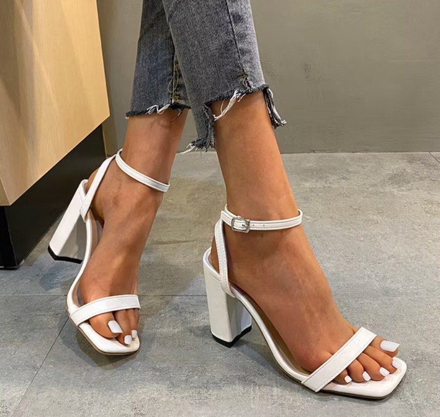 White Block Heel Sandals (Category: Heels) located in Pasig City. Submitted by decluttertrends (Listing ID 1424658061, Image 1). Description: -used once only during the oath taking!! - White block heel sandals - 9cm heel height - Comfortable and snug fit - Made with high-quality fabric - Abrasion-resistant sole - Secure ankle strap.