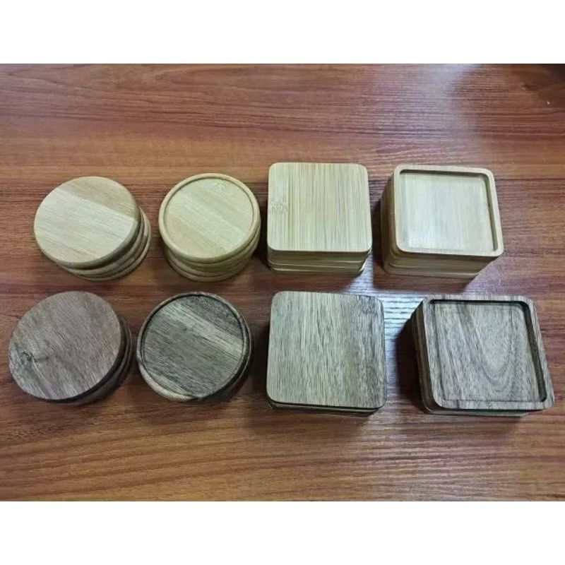 Wooden Coasters - Round and Square (Category: Other Kitchenware & Tableware) located in Makati City. Submitted by meticoolous (Listing ID 1424581904, Image 2). Description: - Set of wooden coasters - Various shapes: round and square - Different wood tones - Raised edges on some to contain spills - Protects tables from water rings and heat - Adds natural elegance to any space Pricelist of each coaster Bamboo 80 Beech 85 Walnut 90 Rosewood 95.