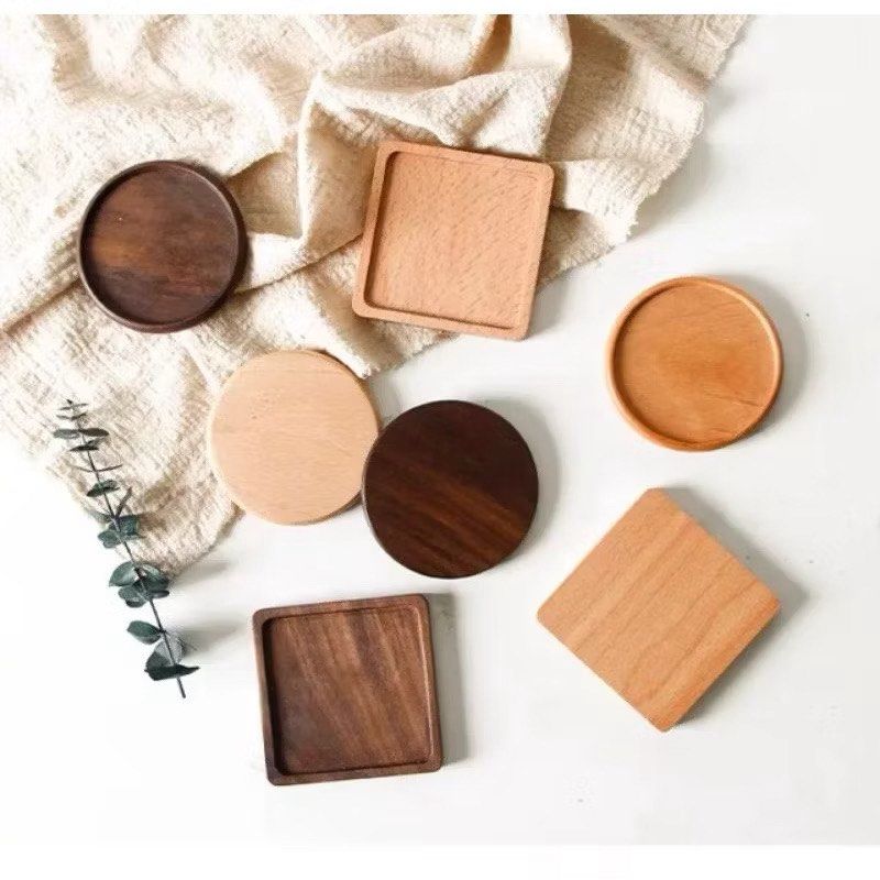 Wooden Coasters - Round and Square (Category: Other Kitchenware & Tableware) located in Makati City. Submitted by meticoolous (Listing ID 1424581904, Image 1). Description: - Set of wooden coasters - Various shapes: round and square - Different wood tones - Raised edges on some to contain spills - Protects tables from water rings and heat - Adds natural elegance to any space Pricelist of each coaster Bamboo 80 Beech 85 Walnut 90 Rosewood 95.