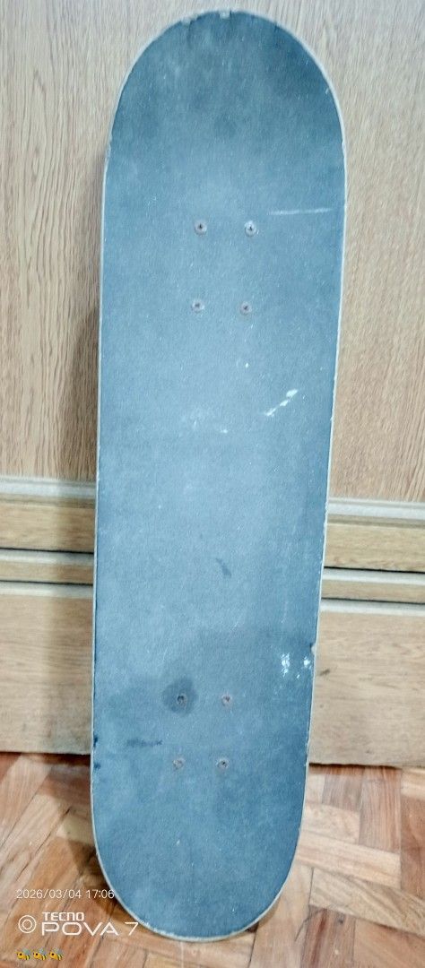 Xiao Chu Skateboard (Category: Skates, Rollerblades & Scooters) located in Manila. Submitted by jhaylex_0422 (Listing ID 1424606440, Image 1). Description: Skateboard features a black deck with red and orange graphics. It has silver trucks and yellow wheels. The deck has some wear and tear. The brand name "Xiao Chu" is visible on the deck. The wheels have "TOP MARK" printed on them..