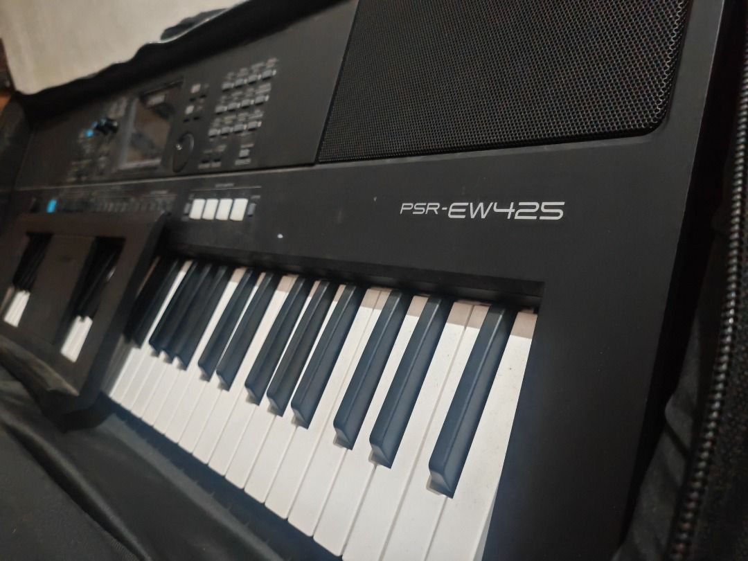Yamaha PSR-EW425 Keyboard with Case (Category: Musical Instruments) located in Quezon City. Submitted by jpcid1 (Listing ID 1424558701, Image 2). Description: Selling my Yamaha PSR-EW425 Keyboard. No issue or whatsoever. Comes with power adaptor, sustain pedal and Padded Gig Bag. Selling it at 29k. PM me for interested buyer. RFS: Upgrading Quick Specs: - 76 full-size, touch-sensitive (velocity-sensitive) keys - 820 built-in voices (instruments, 