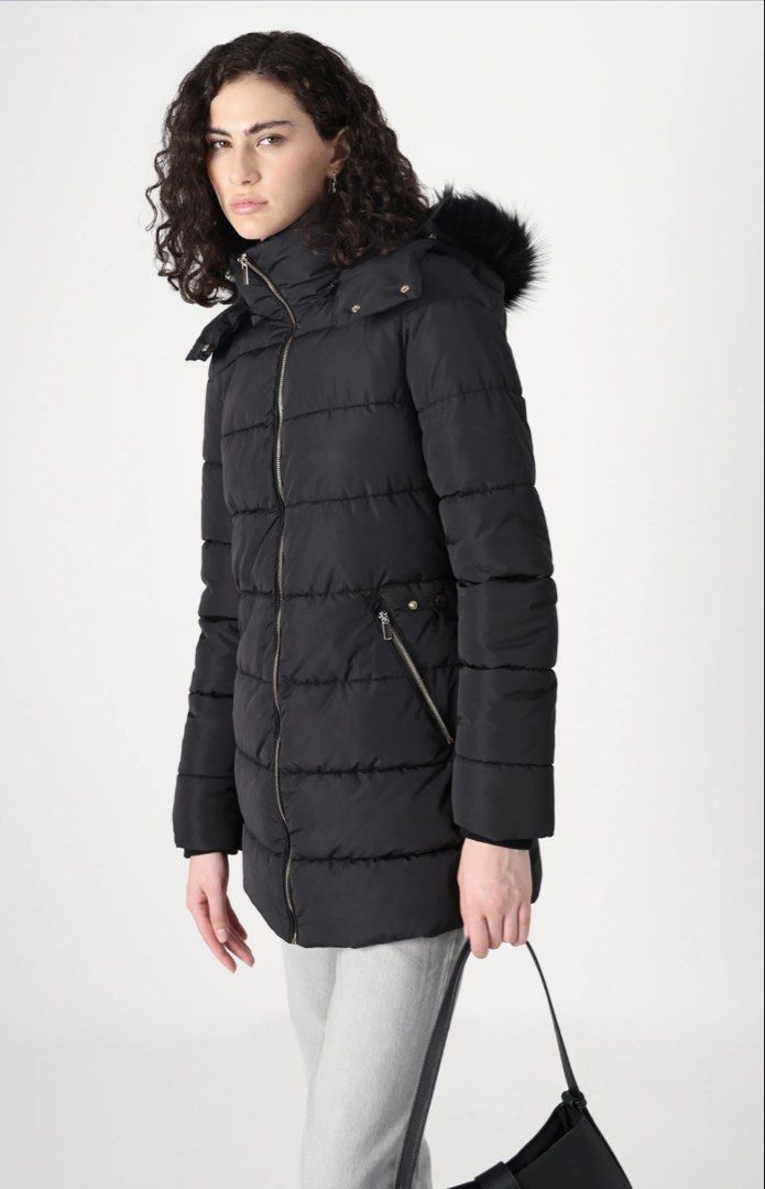 Zara Black Puffer Jacket with Hood (Category: Coats, Jackets and Outerwear) located in Quezon City. Submitted by d.archive (Listing ID 1424699326, Image 2). Description: ZARA Black puffer jacket features a zip-up front and a hood with faux fur trim. It has two zippered pockets on the front. It has a high collar and a fitted silhouette. The jacket is a versatile piece for colder weather. USED ONCE With box NEGOTIABLE RFS: too big for me. Will buy 