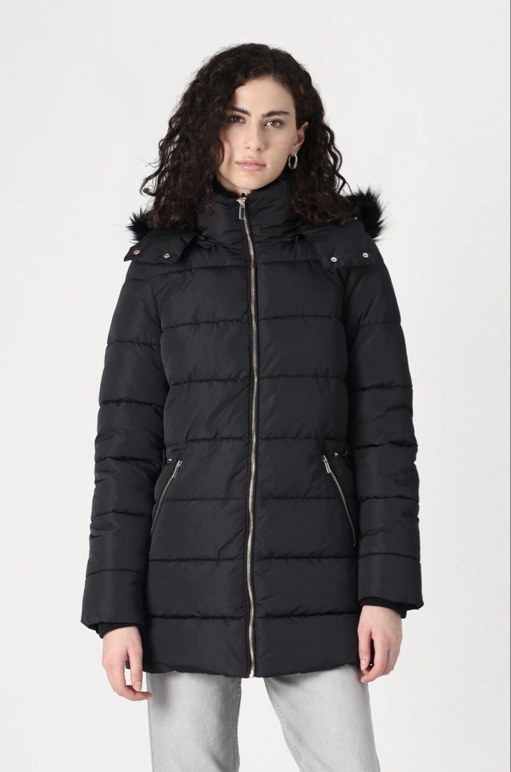 Zara Black Puffer Jacket with Hood (Category: Coats, Jackets and Outerwear) located in Quezon City. Submitted by d.archive (Listing ID 1424699326, Image 1). Description: ZARA Black puffer jacket features a zip-up front and a hood with faux fur trim. It has two zippered pockets on the front. It has a high collar and a fitted silhouette. The jacket is a versatile piece for colder weather. USED ONCE With box NEGOTIABLE RFS: too big for me. Will buy 