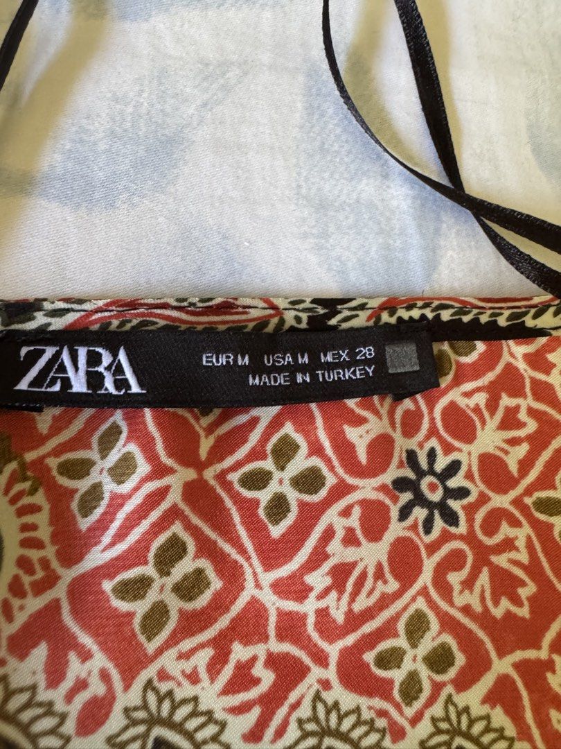 Zara Patchwork Print Dress - Size M (Category: Dresses) located in Makati City. Submitted by blushvanilla (Listing ID 1424539385, Image 2). Description: - Patchwork print wrap dress - Size: M - Features: Long sleeves with elastic cuffs, V-neck - Fabric: Lightweight - Made in Turkey - Suitable for various occasions.