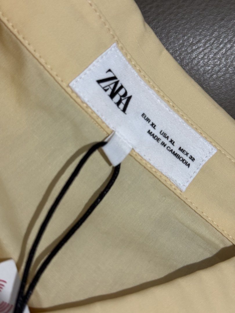 Zara poplin shirt (Category: Shirts) located in Pasig City. Submitted by abbyrds (Listing ID 1424665051, Image 3). Description: - Zara poplin shirt - Size: XL - Color: Pale Yellow - Condition: Brand new with tags - bought from Japan pasabuy RFS: wrong size.