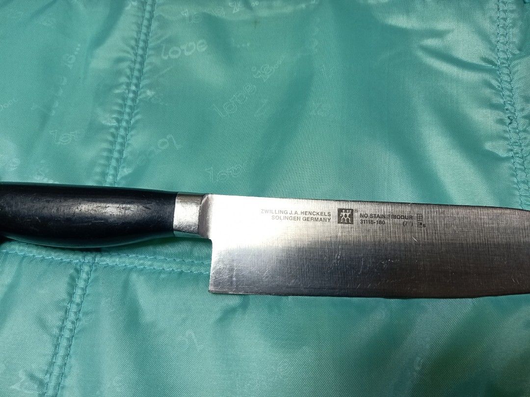 Zwilling j.a henckels (Category: Knives & Chopping Boards) located in Pasig City. Submitted by urdal01 (Listing ID 1424640617, Image 2). Description: - Zwilling J.A. Henckels knife - Features a black handle - Ideal for kitchen use.