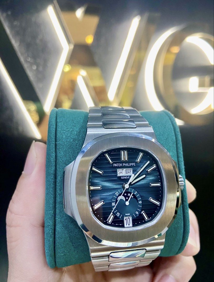 (2022) Almost New Patek Philippe Nautilus Annual Calendar Blue 5726/1A (Category: Watches) located in Singapore. Submitted by watchgen (Listing ID 1424859968, Image 1). Description: Model: 5726/1A Brand: Patek Philippe Description: - Dated 2022 - New style clasp - Full complete set - Almost new condition Located us： 180 Bencoolen Street #01-68 (189646) Opening hours: 1-7pm daily *We provide 6 months in house warranty for all preowned items* Payme