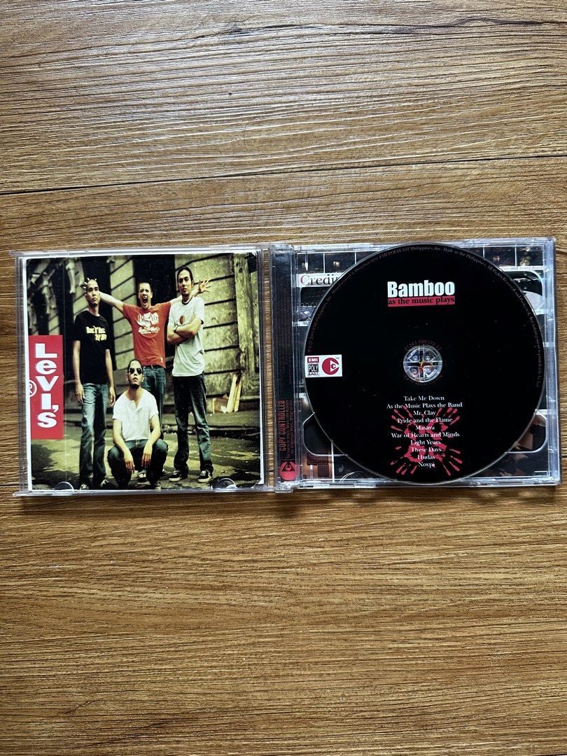 Bamboo As The Music Plays CD (Repackaged 2-CD) (Category: CDs & DVDs) located in Paranaque City. Submitted by safedolphin.dc2bd2 (Listing ID 1424772320, Image 3). Description: - Bamboo "As The Music Plays" CD (Repackaged 2-CD) (2004) - Features famous hits like Noypi, Masaya, and Mr. Clay - Comes with bonus video and audio tracks - OPM - WYSIWYG - Kindly manage your expectations Working, no skips From personal collection With minimal visible hair