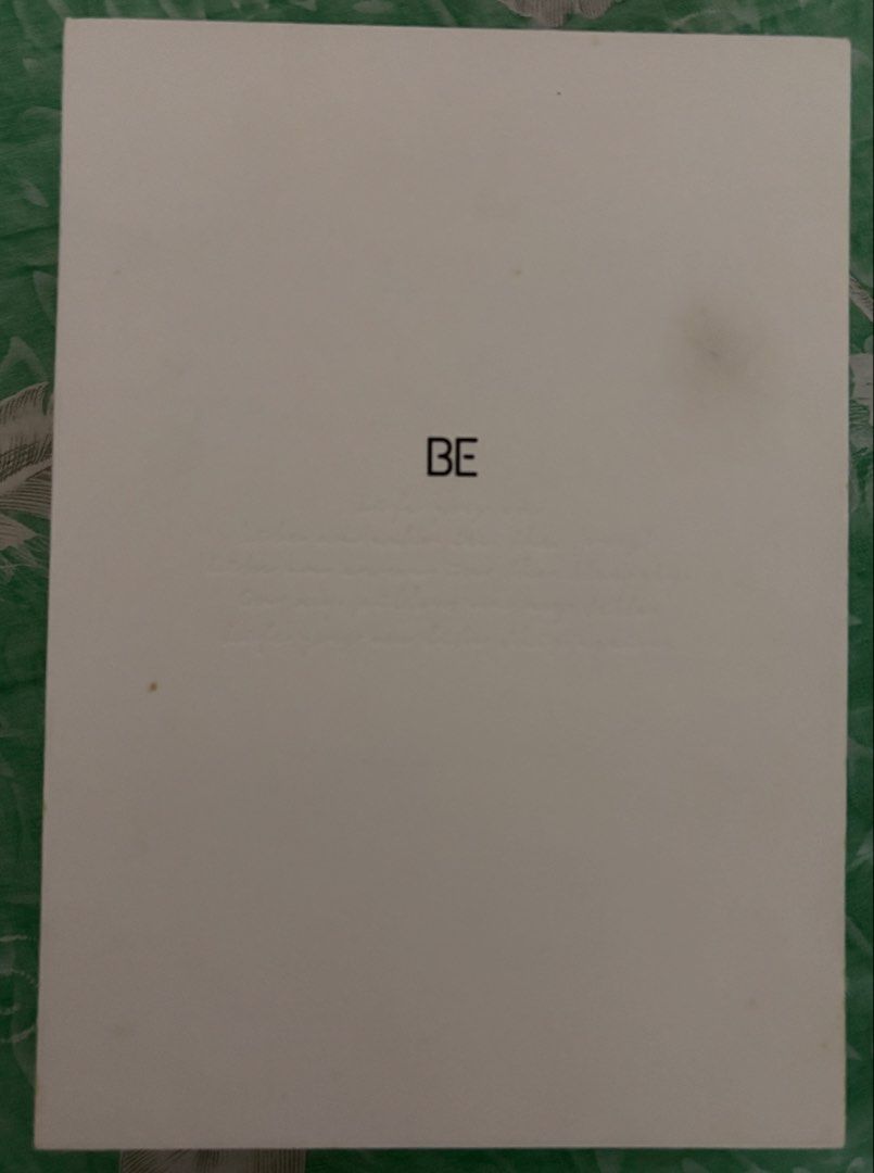 BTS BE Deluxe Edition Album (Category: CDs & DVDs) located in Panabo. Submitted by taecompli (Listing ID 1424792326, Image 1). Description: - Includes photobook, CD, making book, lyric poster, photo frame, 7 postcards, and poster -Section of the photobook became detached - Unsealed.